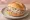 Leberwurst Brötchen: an illustration of pâté, pork and onion on kaiser roll.