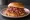 Lexington BBQ Sandwich: an illustration of pork, vinegar and ketchup on burger bun.