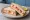 Lobster Sandwich: an illustration of lobster, mayonnaise, butter and lemon on white bread.