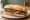 Lomito al Pan: an illustration of beef on baguette.