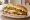 Lomito: an illustration of beef, lettuce, tomato and mayonnaise on baguette.
