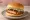 Lotteria — Donkaseu Burger (돈까스 버거): an illustration of pork, cabbage and tonkatsu sauce on burger bun.