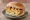 Macaroni Pie Sandwich: an illustration of cheddar cheese and butter.