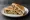 Malai Chaap Sandwich: an illustration of yogurt, butter, onion and cilantro on white bread.