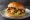Mápo Dòufu Hànbǎo (麻婆豆腐汉堡): an illustration of pork, tofu, garlic, ginger and more on burger bun.