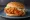 McDonald's Korea — McSpicy Shanghai: an illustration of chicken, hot sauce and lettuce on burger bun.