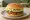 McDonald's Korea — Sanghae Burger: an illustration of pork on burger bun.