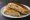 Medianoche: an illustration of pork, ham, swiss cheese, pickle and more.