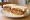 Menchi Katsu Sando - Pork (ポークメンチカツサンド): an illustration of pork, onion, tonkatsu sauce and cabbage on shokupan.