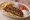 Merida Kebab: an illustration of beef, onion, tomato and tzatziki on pita.