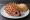 Mett Igel: an illustration of pork, onion, olives and pepper on bread.