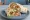 Mexican Chicken Wrap: an illustration of chicken, salsa, guacamole, sour cream and more on tortilla.