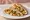 Mfarakeh Sandwich (ساندويش مفركة): an illustration of potato, egg, onion and olive oil on pita.