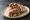 Middle Eastern Shawarma Wrap: an illustration of lamb, chicken, beef, tahini and more on pita.