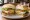 Milanesa Completa: an illustration of beef, ham, cheese, egg and more on baguette.