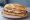 Milanesa con Jamón y Queso: an illustration of beef, ham and cheese on baguette.