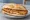 Milanesa de Pollo: an illustration of chicken and egg on baguette.