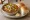 Misal Pav: an illustration of onion, lemon, cilantro, pepper and more on bread.