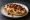 Mollete (Breakfast): an illustration of beans, cheese, egg and chorizo on telera roll.