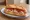 Montadito de Atún: an illustration of tuna, pepper and olive oil on baguette.