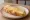 Montadito de Queso: an illustration of cheese on baguette.