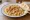Msabbaha (مسبحة): an illustration of chickpeas, tahini, lemon and garlic on pita.