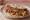 Musakhan (מוסחן): an illustration of chicken, onion, sumac and olive oil.