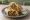 Mutton Egg Roll: an illustration of mutton, egg, onion, pepper and more on naan.