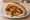 Newark Hot Dog: an illustration of hot dog, onion, pepper and mustard.