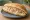 Nohutlu Pilav Ekmek: an illustration of rice, chickpeas and butter on bread.