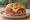 North Shore Roast Beef: an illustration of beef, mayonnaise and cheese on kaiser roll.