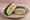 Onigirazu - Avocado (アボカドおにぎらず): an illustration of rice, avocado, mayonnaise and maggi seasoning sauce.