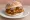 Onion Bhaji Sandwich: an illustration of onion, chickpeas, chutney and cilantro.