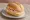 Ontbijtbroodje: an illustration of butter, cheese and ham on kaiser roll.