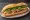 Orange County Bánh Mì: an illustration of pork, pâté, mayonnaise, đồ chua and more on bánh mì baguette.