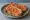 Pa amb Tomàquet: an illustration of tomato, olive oil and garlic.