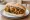 Pakora Roll: an illustration of chickpeas, onion, potato, spinach and more.
