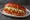 Pambazo de Chorizo con Papa: an illustration of chorizo, potato, lettuce, queso fresco and more.