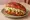 Pambazo: an illustration of chorizo, potato, lettuce, queso fresco and more.