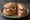 Pan Bagnat au Thon: an illustration of tuna, anchovy, egg, tomato and more.
