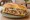 Pan con Lechón: an illustration of onion on cuban bread.