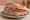 Pane Toscano con Salumi: an illustration of the sandwich.