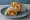 Paneer Frankie: an illustration of onion and chutney on naan.