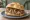 Panino al Lampredotto: an illustration of tomato, onion, celery, parsley and more.
