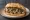 Panino al Lampredotto Gourmet: an illustration of salsa verde, parsley, caper, anchovy and more.