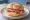 Panino al Prosciutto: an illustration of prosciutto on kaiser roll.