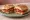 Panino Calabrese: an illustration of pork, 'nduja, soppressata and pepper.