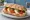 Panino Caprese: an illustration of mozzarella, tomato, basil and olive oil on ciabatta.