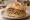 Panino con Bigoli in Salsa: an illustration of anchovy, onion and olive oil on kaiser roll.