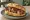 Panino con Bombette: an illustration of pork, capicola and cheese on kaiser roll.
